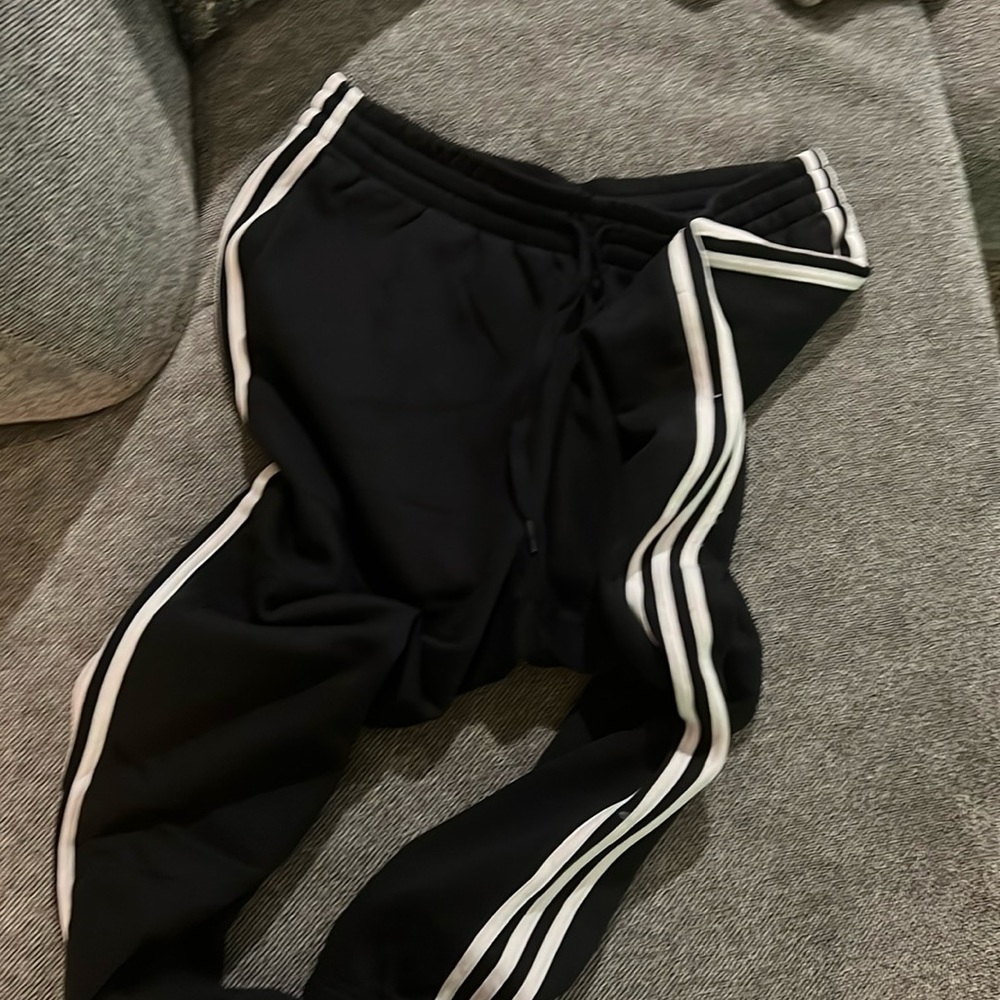 Adidas Large sweat pants with cinched bottom.